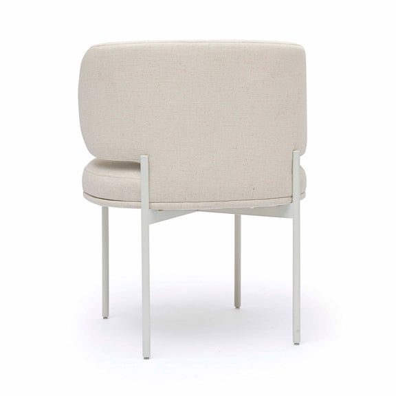 Off-white dining chair showing back and seat padding with straight white legs