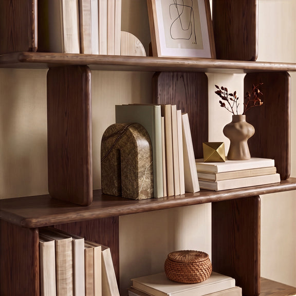 Green marble bookend with arched form and black veining