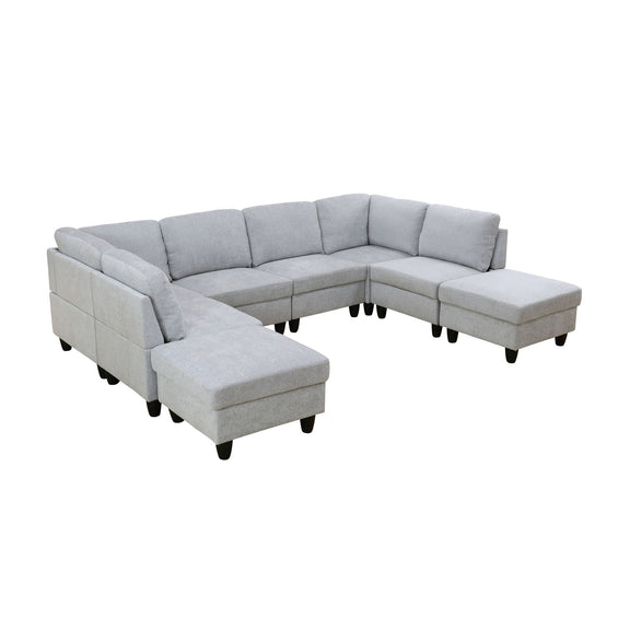 Light gray U-shape modular sectional sofa with padded armrests and ottoman chaise ends