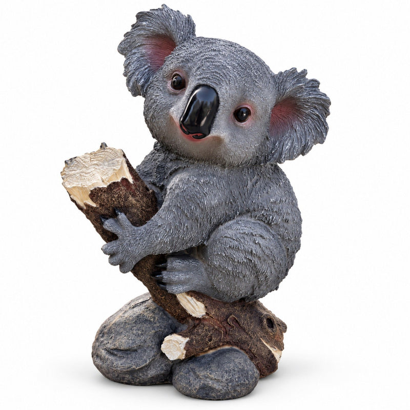 Dark gray hand-painted koala statue hugging a log, with a textured tree-stump base.