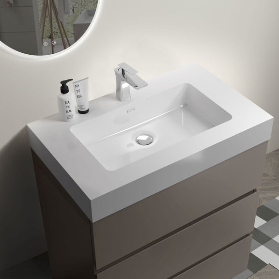 Freestanding bathroom vanity with white sink, white cabinet, two drawers
