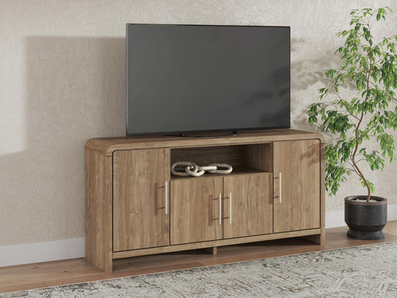 Brown wooden TV stand with TV on top and three cabinet doors