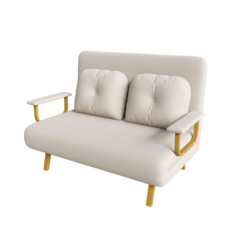 Convertible sofa bed, white fabric with tufted back and gold-tone metal legs.