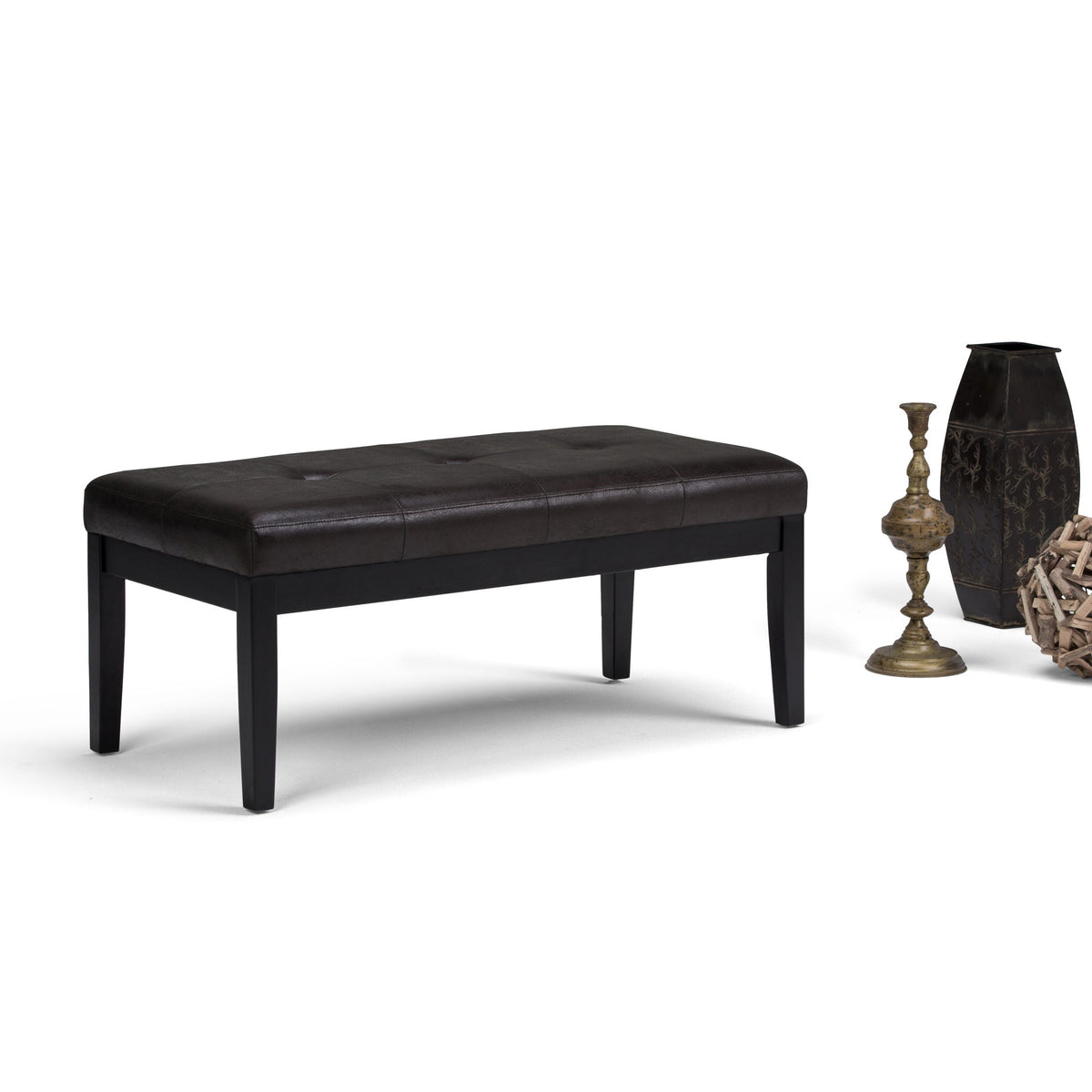 Black upholstered tufted ottoman bench with button-style tufting and tapered wooden legs