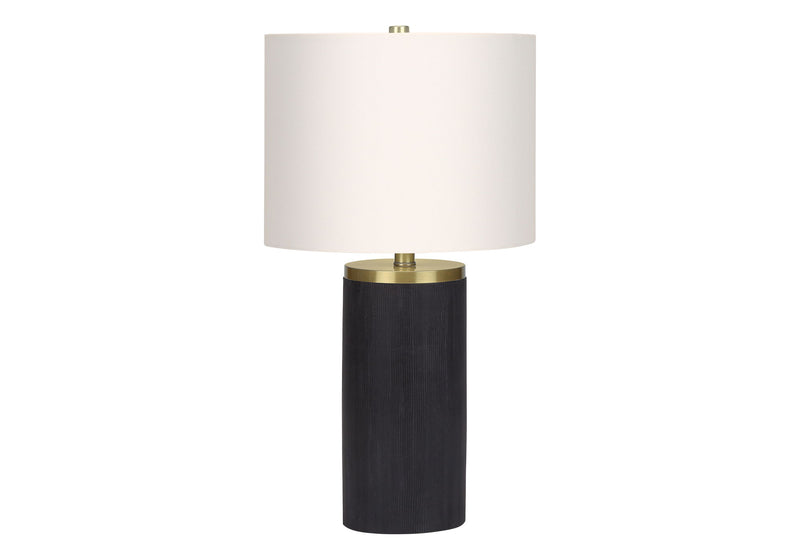 Modern table lamp with white drum shade and dark ribbed concrete base