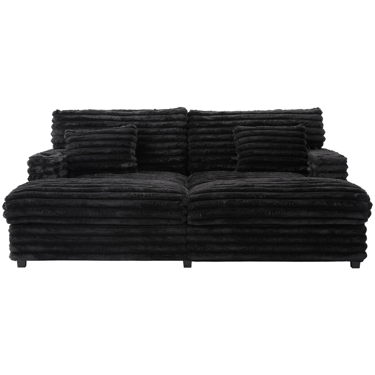 Oversized double chaise lounge sofa in dark fabric with ribbed cushions and bolster pillows