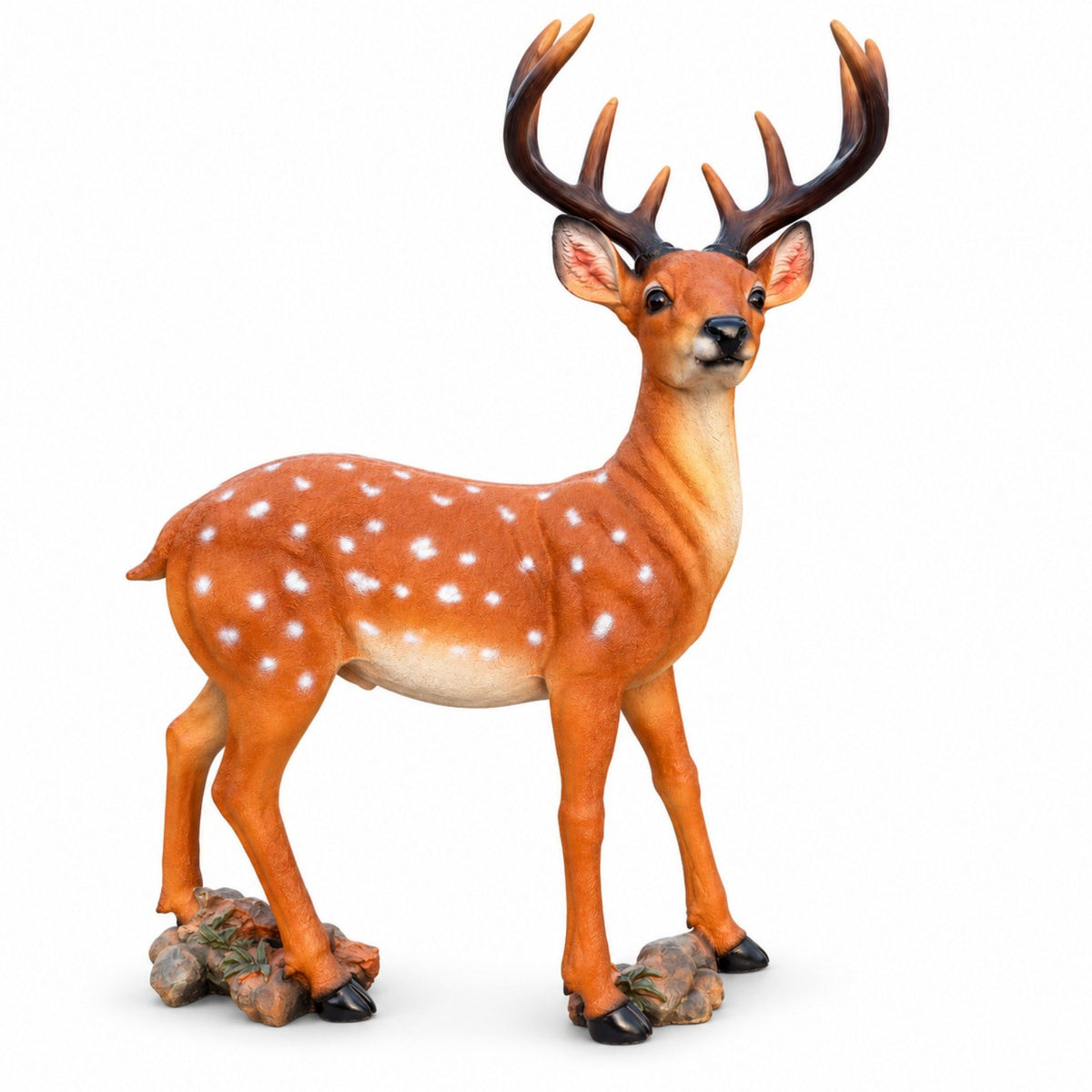 Brown deer garden statue with white spots, dark antlers, and rocky base