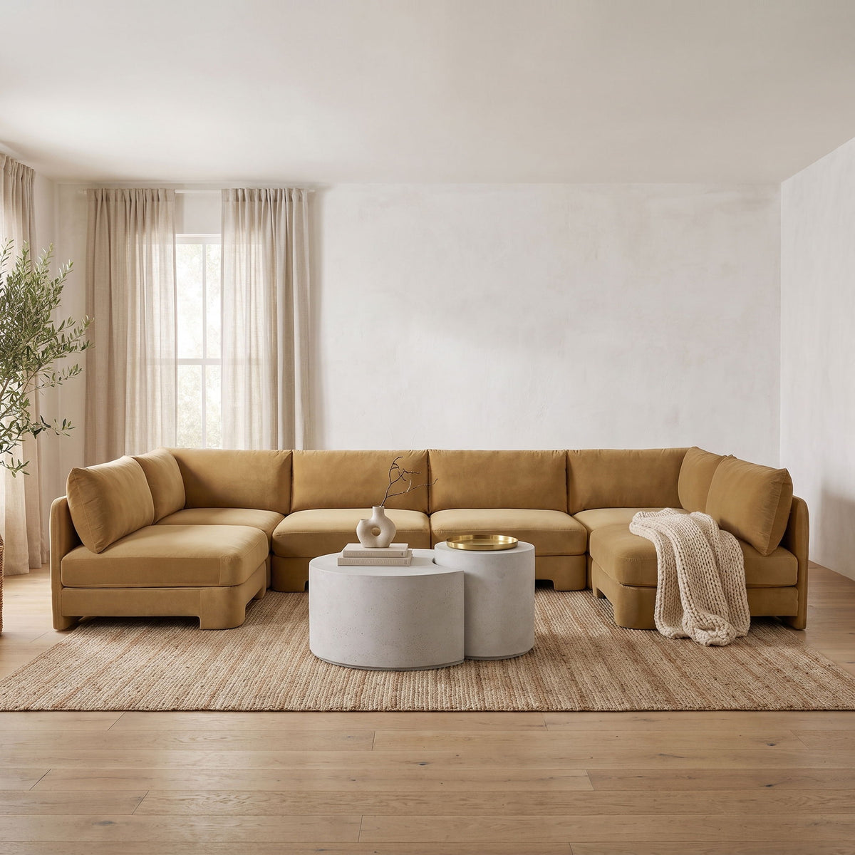 Beige velvet armless U-shaped sectional sofa with multiple seat and back cushions