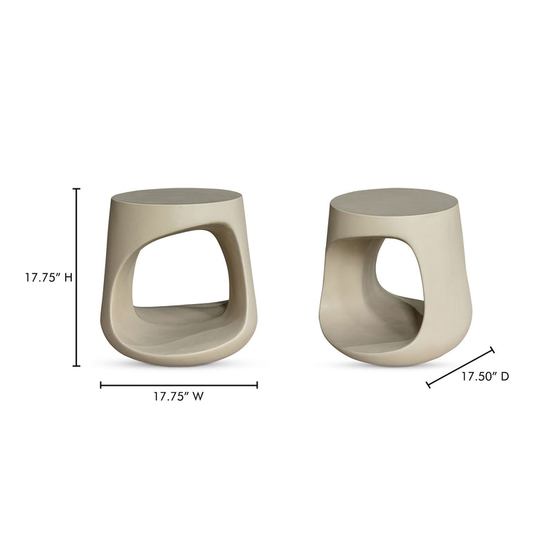 Cream sculptural outdoor stool with oval cutout opening, thick tapered sides.