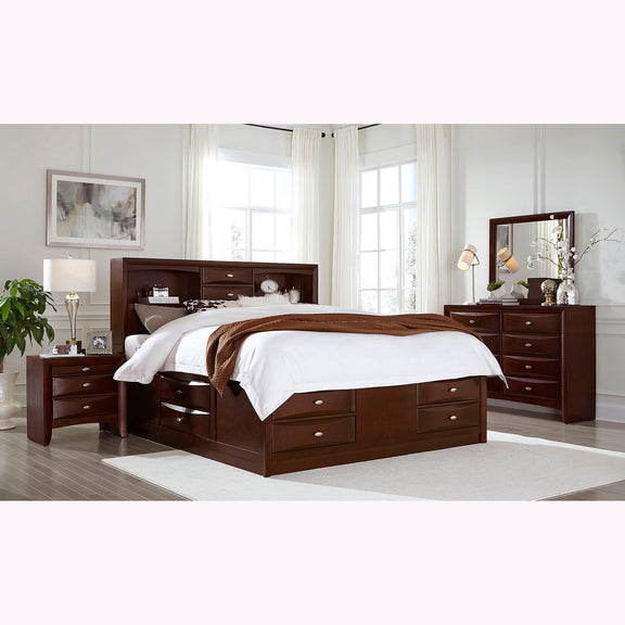 Dark brown nightstand with three drawers and round silver pulls beside bed