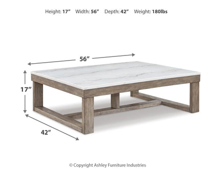 Loyaska - Brown/ivory - Rectangular Cocktail Table