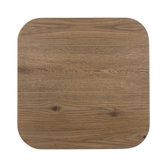 Tawny brown wood tabletop close-up with swirling grain pattern and rounded corners