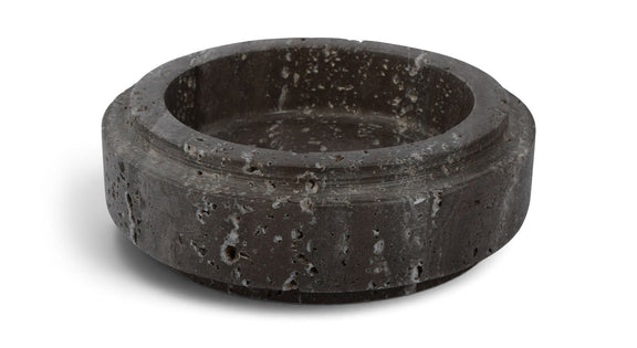 Charcoal gray travertine bowl with round rim and speckled stone surface