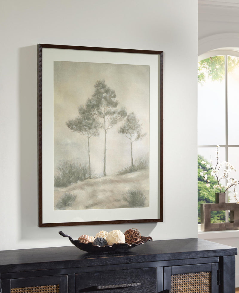 Framed wall art print featuring tall trees in foggy pastel gray and beige