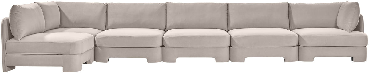Light gray armless sectional sofa with tufted cushions and low white legs
