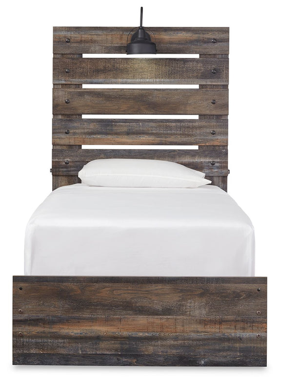 Drystan panel bed with dark wood frame, slatted headboard, and white upholstered pillows.