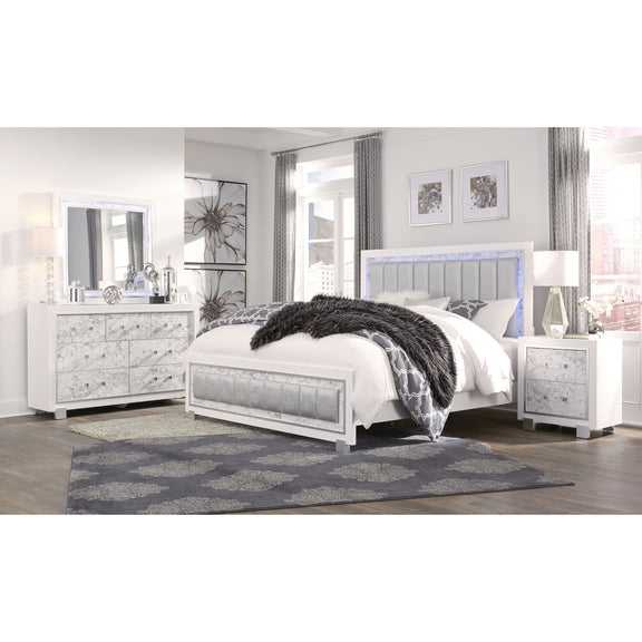White marble-front dresser with multiple drawers and cabinet doors, side view