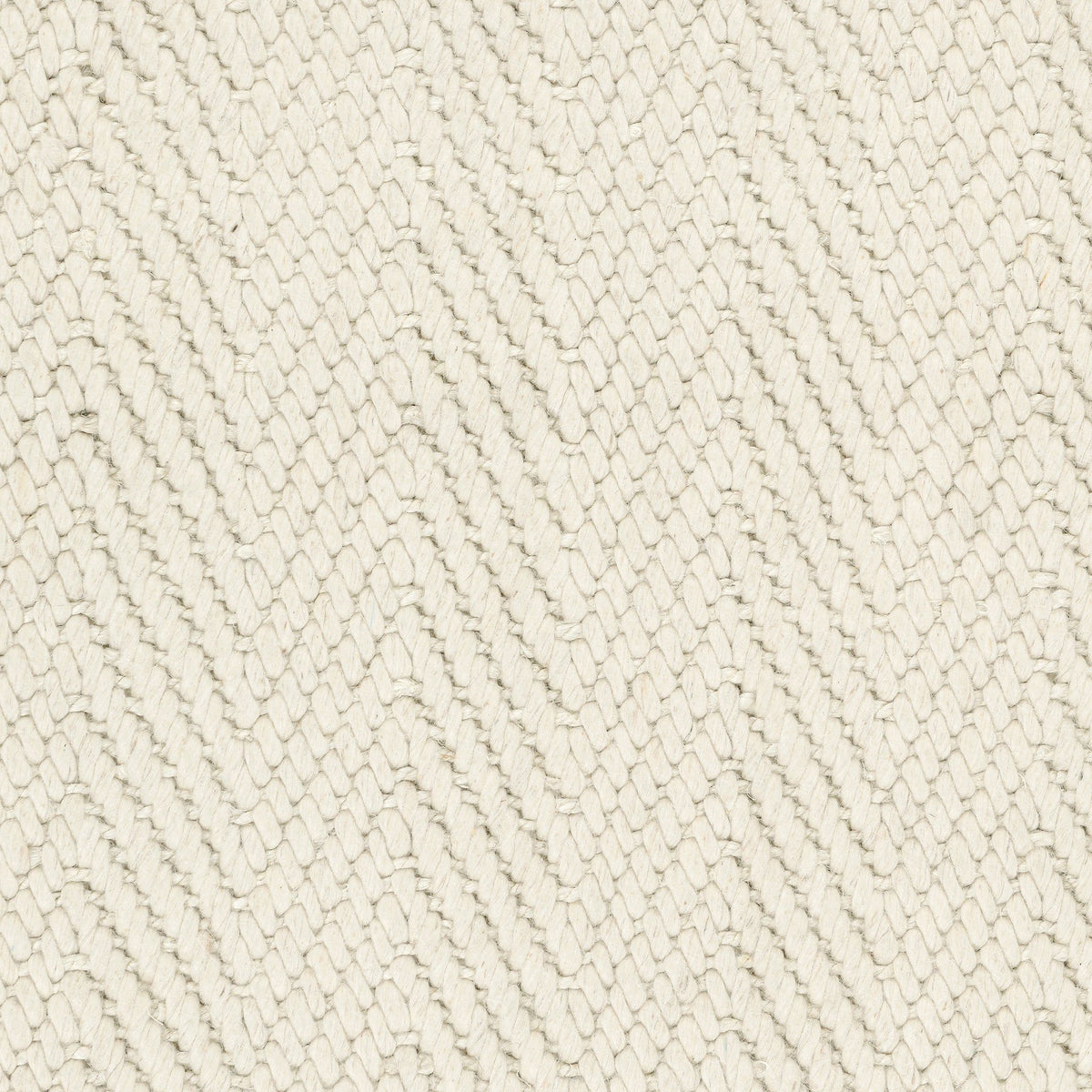 Close-up chenille herringbone rug texture, off-white zigzag weave