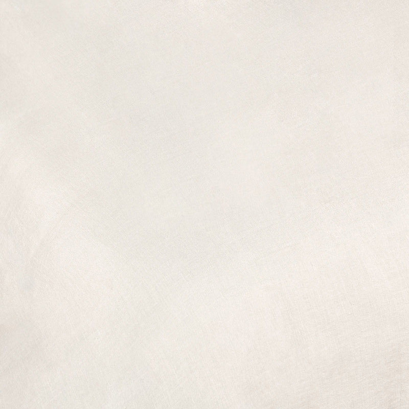 Light ivory hemp fabric close-up with visible woven texture and subtle specks