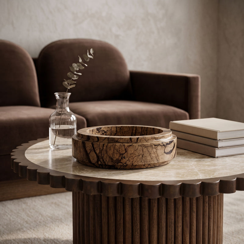 Light brown marble bowl with wide round rim and crackle veining, shallow basin.