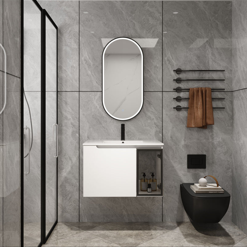 White wall-mounted bathroom vanity with integrated sink and glass-front cabinet door