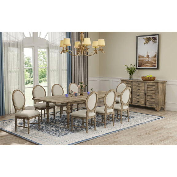 Two upholstered dining chairs with oval backs, light beige seats, distressed wood frames