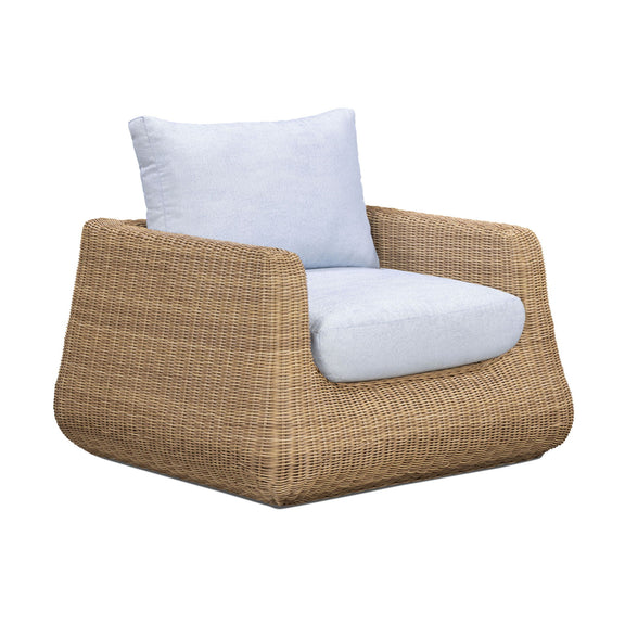 Outdoor accent chair with light blue cushions, woven wicker frame, side view