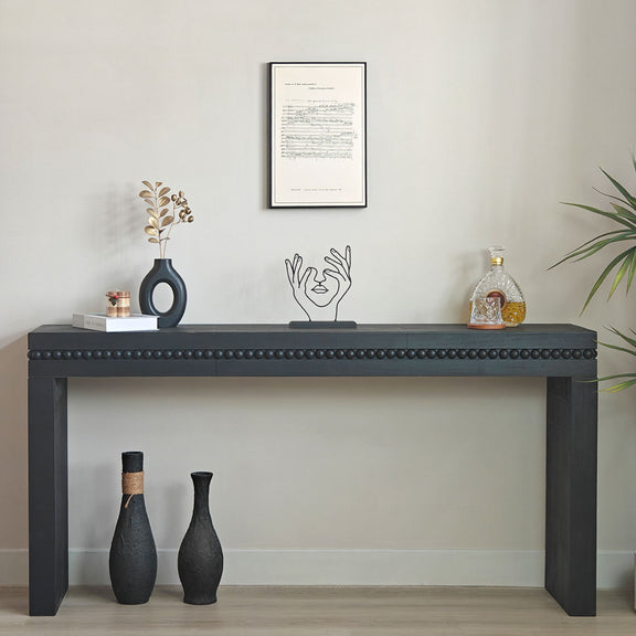 Rectangular black wood console table with beaded trim and open shelf