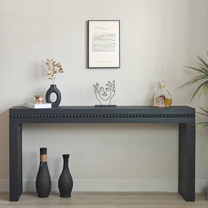Rectangular black wood console table with beaded trim and open shelf