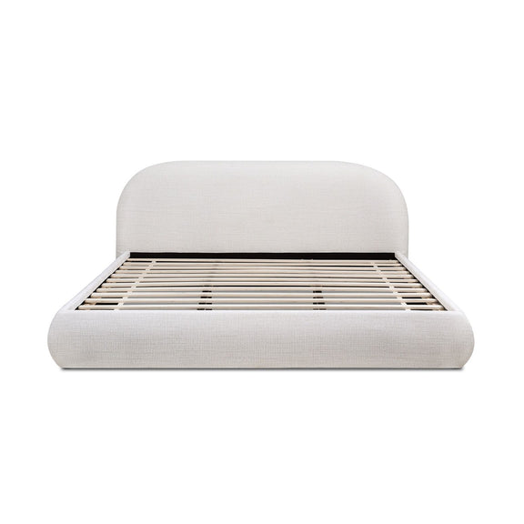 Upholstered platform bed in light gray/white with rounded headboard and slat support