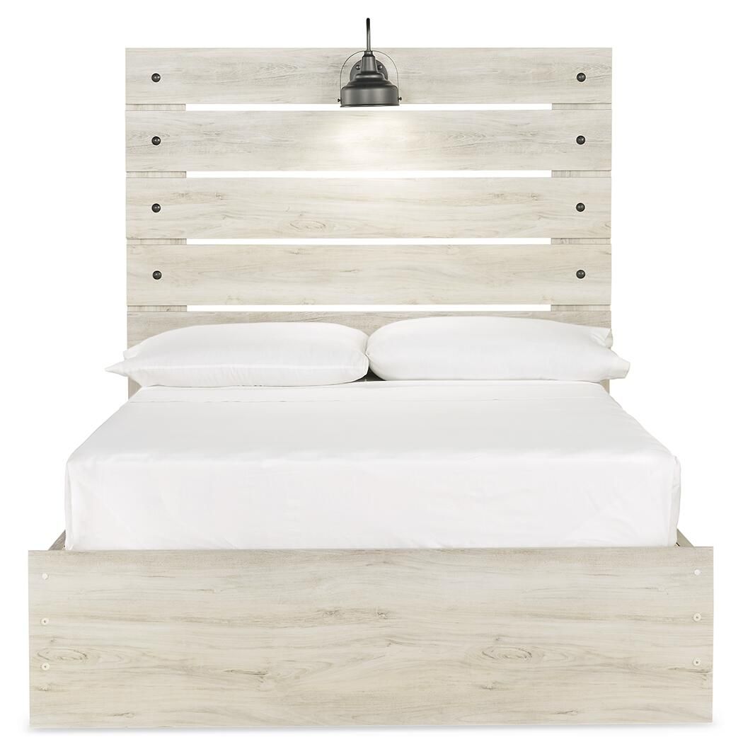 Cambeck panel bed with slatted headboard, white bedding, and light wood front panel base