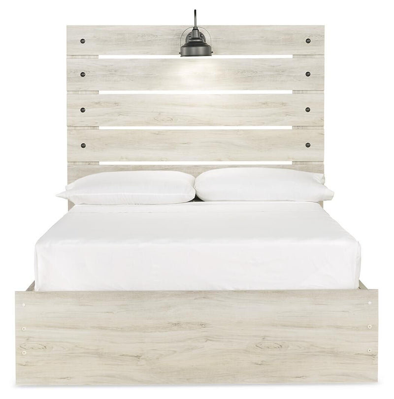 Cambeck panel bed with slatted headboard, white bedding, and light wood front panel base