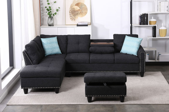 Dark gray sectional sofa with left-facing chaise and ottoman, blue accent pillows