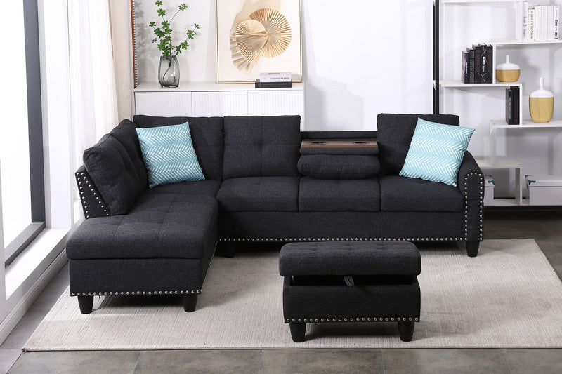 Dark gray sectional sofa with left-facing chaise and ottoman, blue accent pillows
