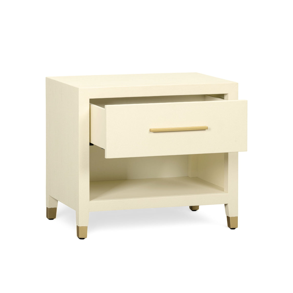 Cream nightstand with open shelf and single drawer, gold-tone bar pull, angled view.