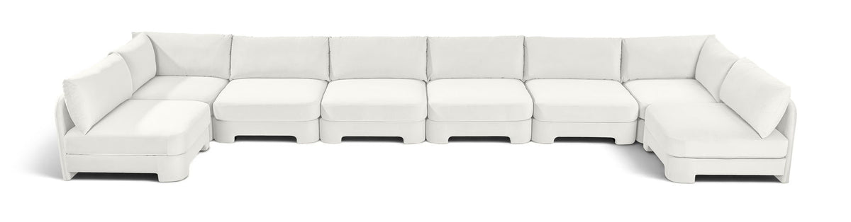 White armless U-shaped sectional sofa with chaise modules and box cushions