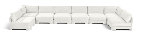 White armless U-shaped sectional sofa with chaise modules and box cushions