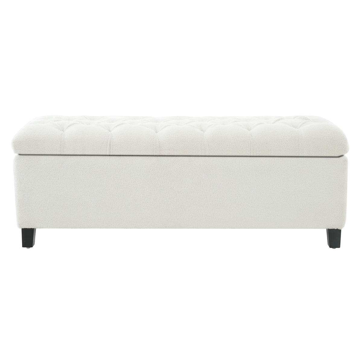 White upholstered storage bench with tufted padded top and hinged lid.