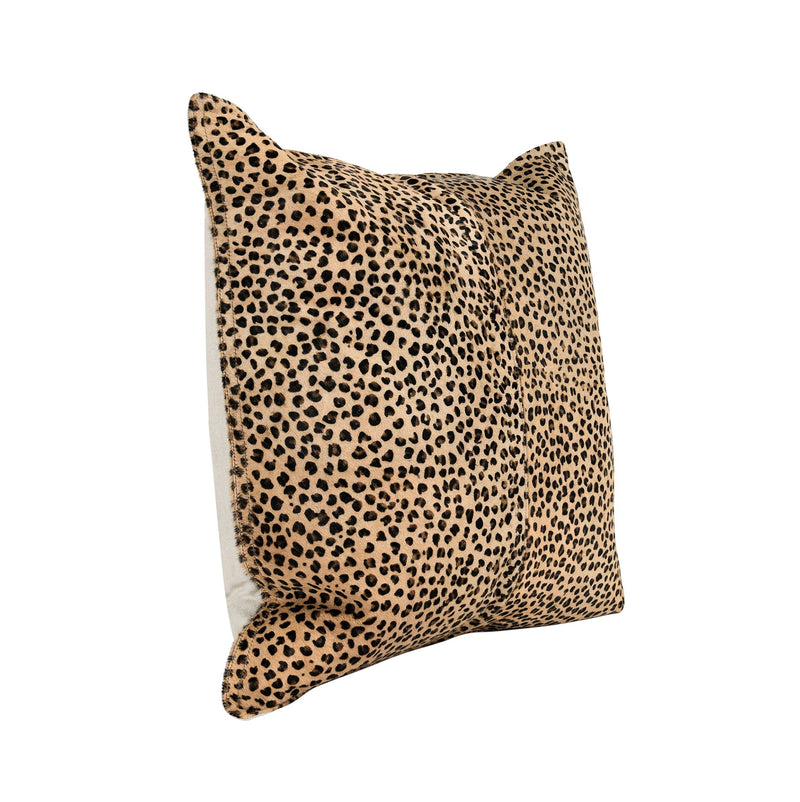 Leopard-print lumbar pillow in camel with black spots, angled view with stitched seams.