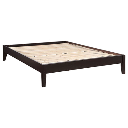 Dark brown platform bed frame with slatted wood support and tapered legs