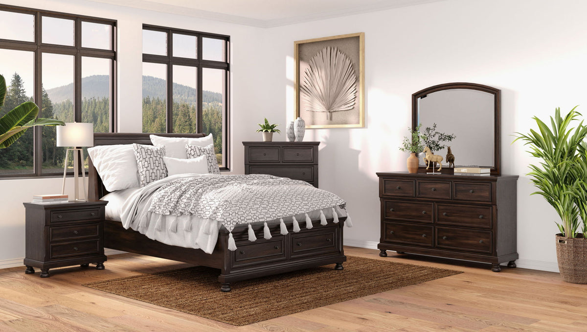 Cherry dresser with seven drawers and metal pulls, styled in a room