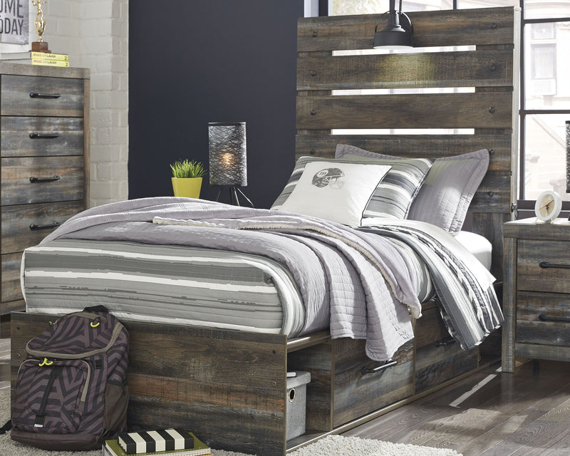 Drystan panel bed with dark wood panel headboard, side storage drawers, and striped bedding.