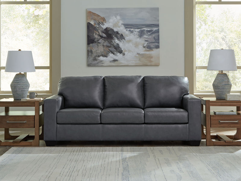 Dark gray 3-seat sofa with plush cushions and boxy padded arms