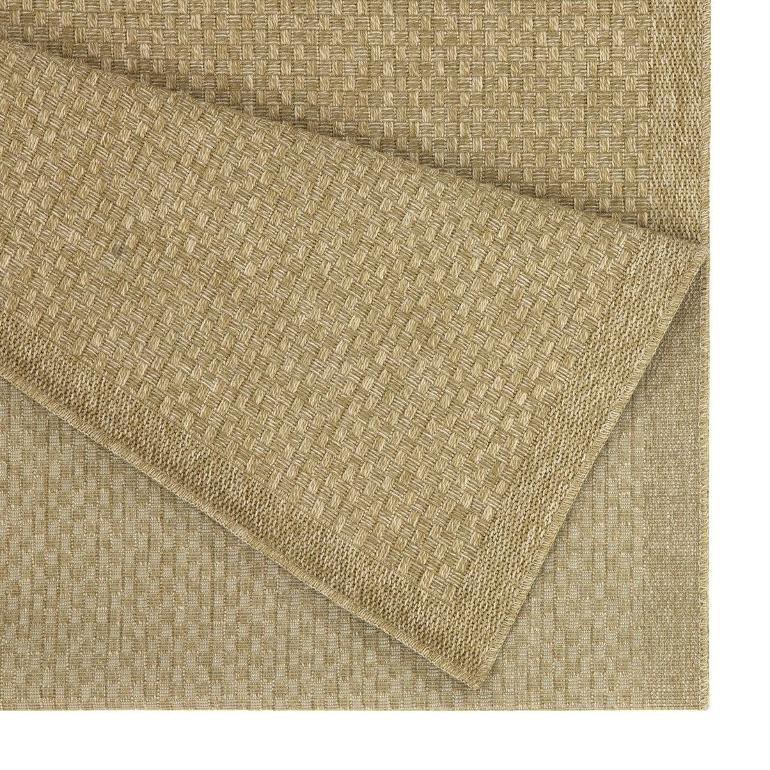 Beige jute area rug corner close-up, flat woven texture and stitched edge