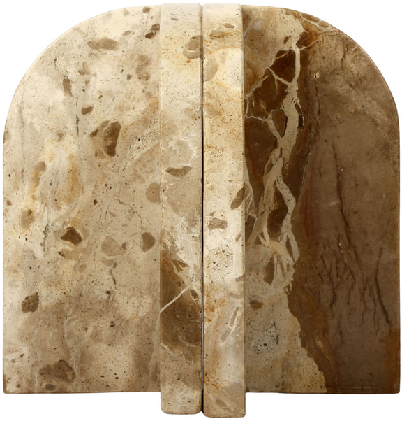 Beige marble bookends with mottled stone texture and arched backs, close-up