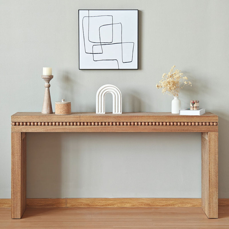 Rectangular light brown wood console table with beaded trim and open shelf