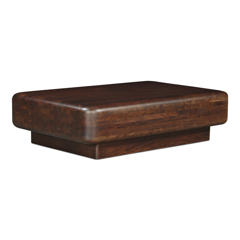 Dark brown wooden coffee table with rounded edges and block pedestal base, shown at an angle.