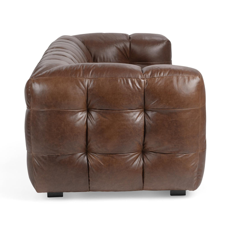 Chestnut-brown tufted leather loveseat sofa, front view with track arms.