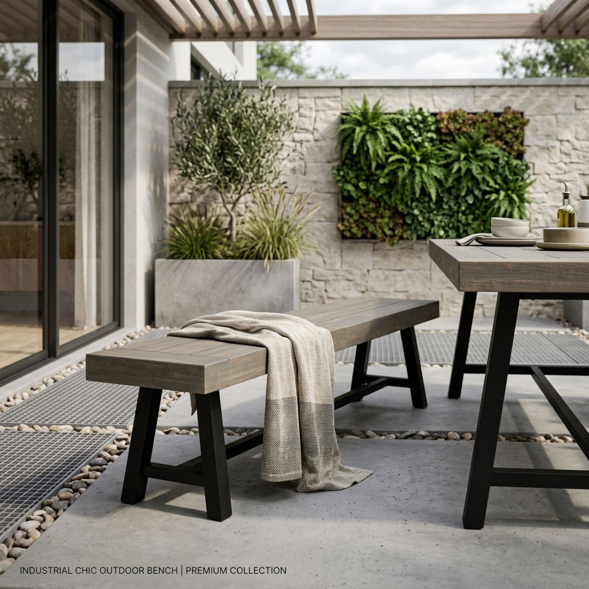 Outdoor patio bench with rustic wood-look slat seat and dark metal legs
