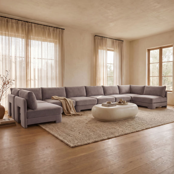 Light gray armless U-shaped sectional sofa with chaise modules and box cushions